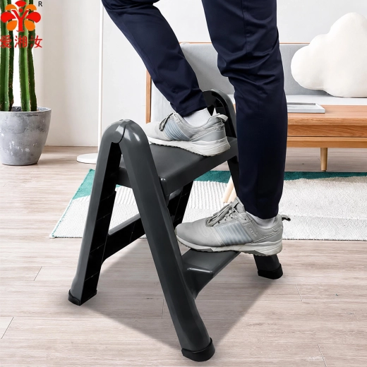 Foldable two-step step stool ladder with non-slip steps