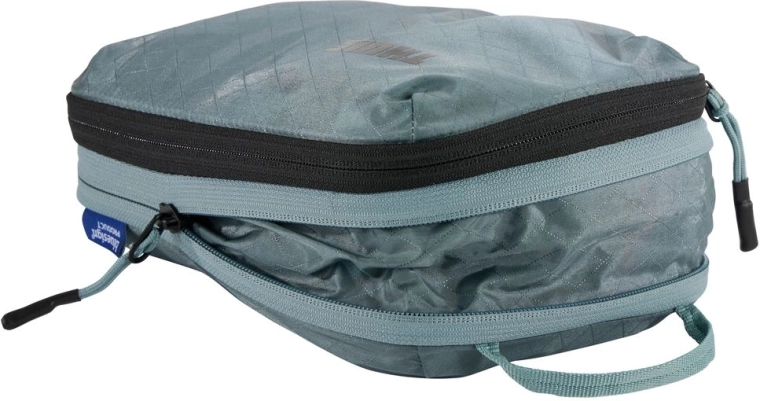 Compression zipper for maximum space