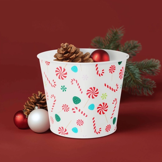 Christmas metal bucket-shaped planter with candy cane design