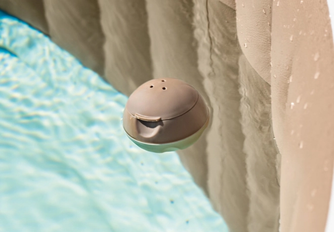 Floating chemical dispenser