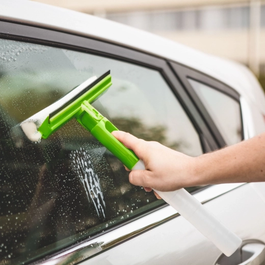 Window Cleaner with Reservoir and Rubber Squeegee