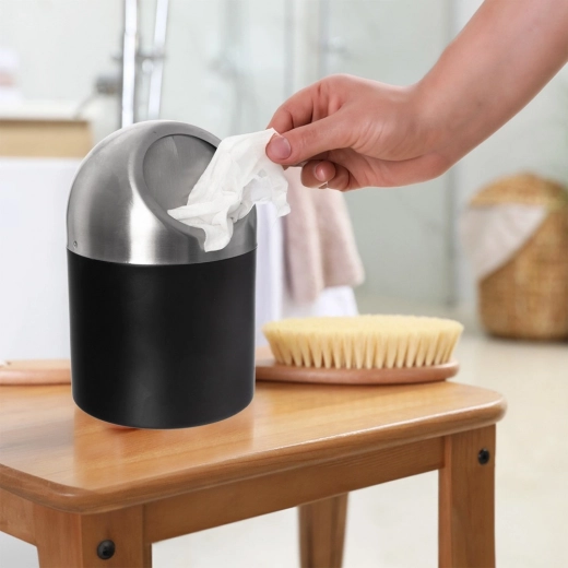 One-handed disposal with swing flap