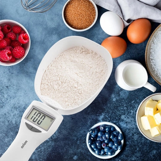 Weigh while scooping