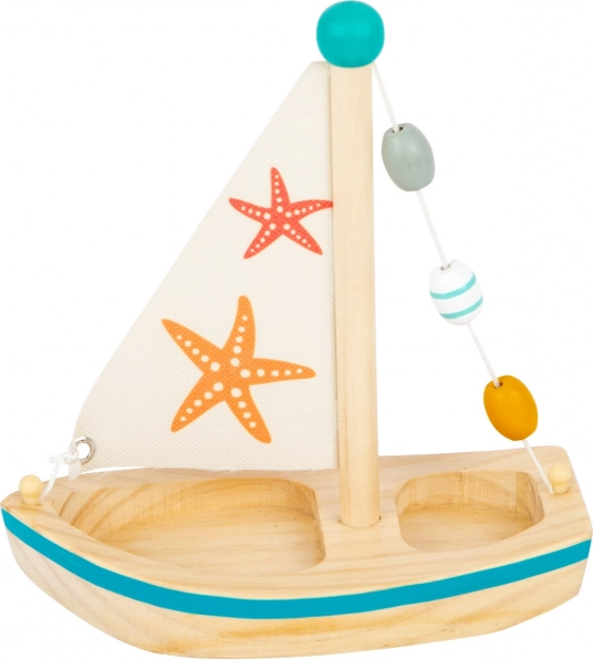 Small Foot wooden sailboat with starfish for water play