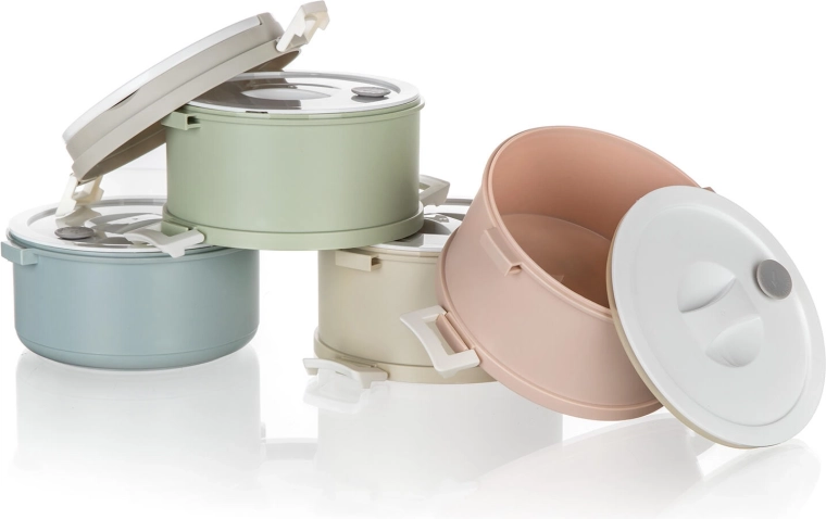 Sealing lids with steam-release vent