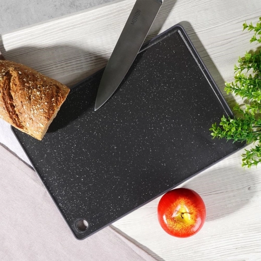Groove and raised edge to prevent mess