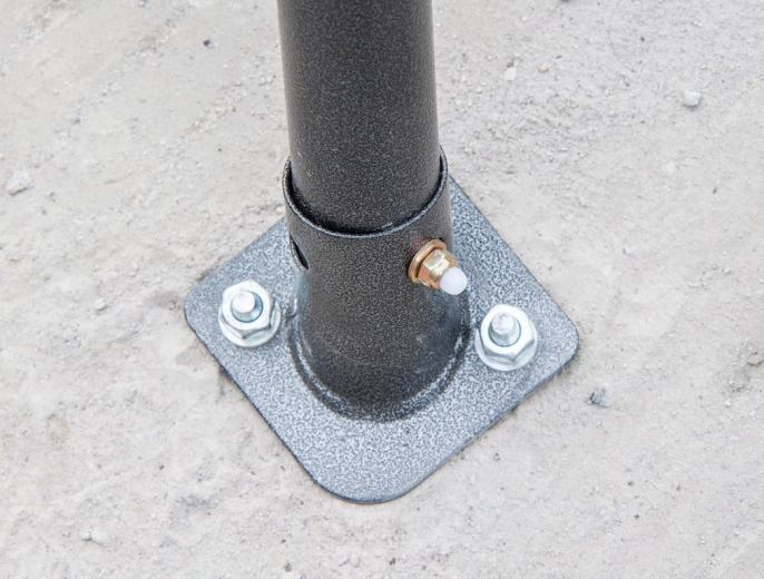Firm anchoring to concrete, asphalt and paving