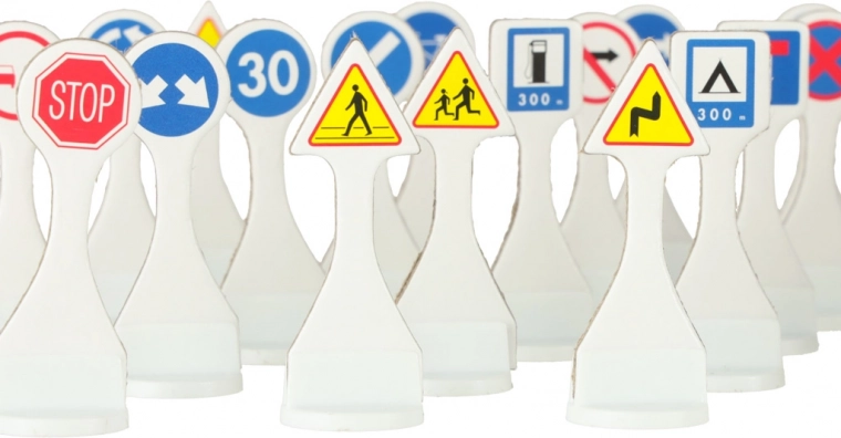 Learning traffic rules through play